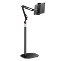 Height-adjustable foldable tablet and phone floor stand holding a tablet in landscape orientation